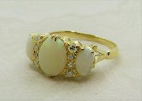 Antique Guest and Philips - Opal Set, Yellow Gold - Eleven Stone Ring