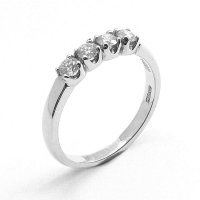 Four Stone Diamond Ring, Set in 18ct. White Gold