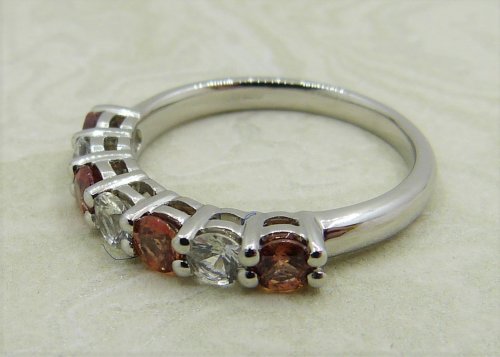 Antique Guest and Philips - 0.70ct (4) Orange Sapphire Set, Platinum - Seven Stone Ring R4736